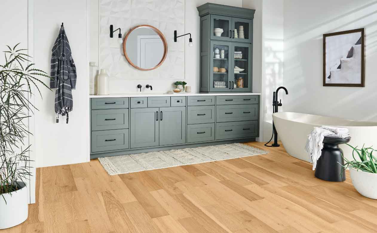 Rustic style bathroom with hardwood flooring.