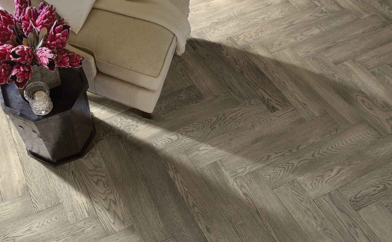 Grey herringbone hardwood flooring 